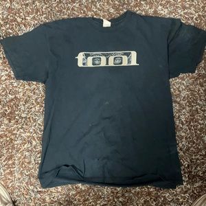 Took 10000 days T-shirt.Small hole in the front but it’s like 15 years old